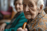 Fototapeta Tęcza - Elderly person with wood cane