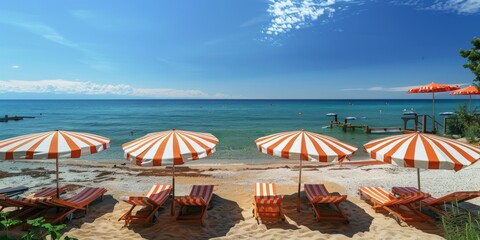 Poster - A beach with a row of colorful umbrellas and chairs
