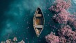 ariel view of a lone rustic boat in the hot and cold water, flowers blooms inside the boat.