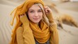© Andrei - Desert editorial  minimalist portrait of woman in headscarf showcasing new clothing collection