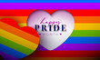 LGBTQ Pride Month Illustration with Cut Out Heart Symbol on Rainbow Flag Background. Love is Love Human Rights or Diversity Concept. Vector LGBT Event Banner Design for Postcard, Banner, Greeting Card