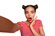 OOPS! Self portrait of cute, trendy and shocked woman with bun hairdo wide open eyes mouth shooting selfie on front camera isolated on red background