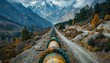 A pipe travels on a mountain dirt road under a cloudy sky