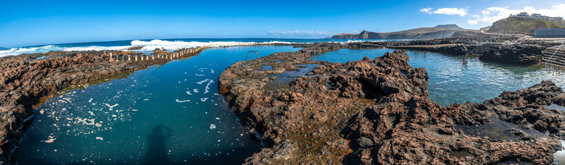 Wall Mural - Panoramic view of the Las Salinas de Agaete natural pools in Puerto de Las Nieves in Gran Canaria, Spain.