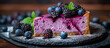 Slice of berry cheesecake close up. Pastry food, sweet and delicious dessert. Blueberry and blackberry cake.	
