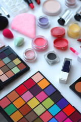 Wall Mural - Various colorful beauty products on white background. Selective focus.