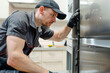 © Vera - Stainless steel upscale refrigerator repair for fixing appliance