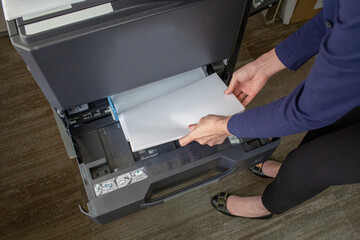 Reload paper at printer