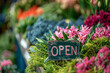 Vibrant Flower Shop Display Welcoming Customers with Open Sign