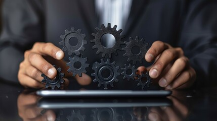 Poster - he holds a tablet pc, with a number of online services on it. he touches the gears icon and touches 
