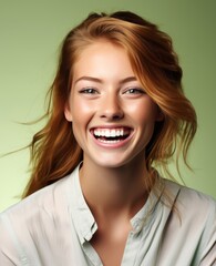 Portrait of caucasian girl, wearing a casual clothing and smiling on studio color background