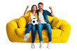 © PixelXpert - Cheerful couple woman man football fans cheer up support favourite team on sofa with soccer ball, hugging, clenching fists Isolated on transparent background.