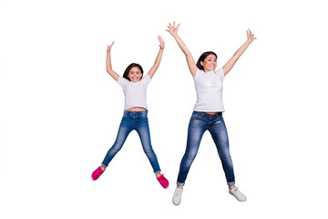 Wall Mural - Full length body size view of two nice lovely attractive charming cheerful funny slim people in white t-shirt jeans denim raising hands up party isolated over blue pastel background