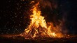 A traditional bonfire ablaze with crackling flames, symbolizing the victory of good over evil as part of the Holika Dahan ritual during Holi celebrations.