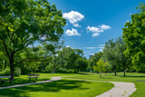Fototapeta Miasto - Serene Wilderness and Urban Interface: A Sunny Day View of Oz Park, Chicago