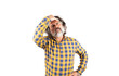 A man with a beard and a plaid shirt complains of a headache. Headache