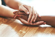 © peopleimages.com - Empathy, people and holding hands for support, help and comfort during grief, mourning and care for healing. Trust, friends and embrace for loss, mental health and to show love for hope or assurance