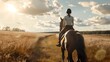 Horseback Riding at Sunset Through Golden Fields