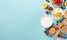 Top View Of Healthy Breakfast Concept With Fresh Pancakes, Berries, Fruit On Blue Backgroudt. Free Space For Your Text.