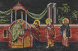 Christian traditional image of the Presentation of Jesus at the Temple. Religious illustration on black stone wall background in Byzantine style