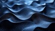 Abstract dark background. Close up view of a dynamic wavy surface	