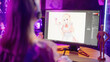 Female anime artist drawing reveal cute anime maid girl on computer