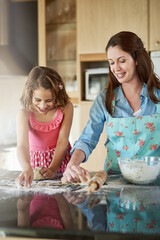 Sticker - Mother, child and baking dough in kitchen or learning support for breakfast, bread or bonding. Woman, daughter and flour on counter or teaching girl in home for homemade cookies, dessert or happiness