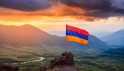 the flag of armenia on the mountain.