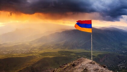the flag of armenia on the mountain.