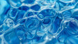 Blue background of water gel with a lot of bubbles, movement and energy