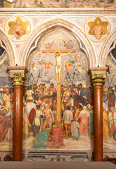 Wall Mural - Large decorative wall fresco representing Jesus´ crucifixion inside gothic church in Italy