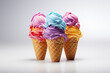 Set of three types of sweet multicolored gelato ice-cream in a waffle cones with different fruit and berry flavors isolated on a white background. Summer concept