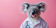 © SHOTPRIME STUDIO - Cute koala dressed as a doctor with stethoscope on pink background for animal healthcare concept