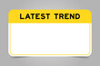 Label banner that have yellow headline with word latest trend and white copy space, on gray background