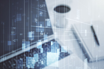 Poster - Multi exposure of creative statistics data hologram on laptop background, stats and analytics concept