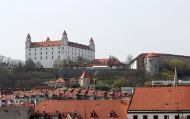 Wall Mural - View of the Old Town from the Castle Hill, Bratislava, Slovakia. Street view, old red roofed houses. Spring in Europe. 