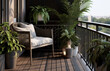 Beautiful balcony or terrace with wooden floor, chair, green potted flowers plants. Stylish balcony home terrace with city background