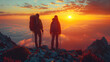 A couple stands above a sea of clouds on a mountain peak, admiring the breathtaking sunset in a serene moment of accomplishment