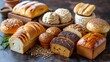   A wooden tray bears various kinds of breads and muffins atop it ..A wood tray, laden with diverse types of breads and muffins,