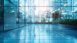 Blurred glass wall of modern business office building at the business center use for background in business concept. Blur corporate business office. Abstract windows with a blue tint