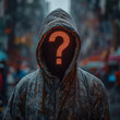 © Anek - A man is wearing a hoodie with a question mark on it