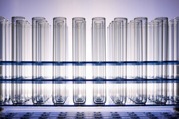 Wall Mural - Glass test tubes placed in a laboratory rack