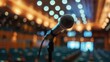 Close-Up of Microphone on Stage With Bokeh Lights