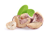 Fototapeta Lawenda - Roasted cashew with leaves in closeup