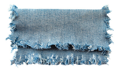 Wall Mural - Piece of torn denim on a white background. Denim texture