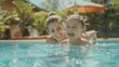 A woman and a child enjoying a swim in a pool. Suitable for family vacation concepts