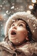 A little girl in a winter coat and hat with snow falling around her. Suitable for winter and seasonal concepts