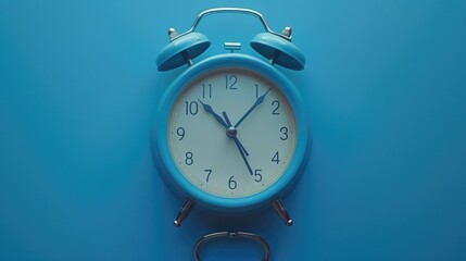 Poster - A blue alarm clock against a blue backdrop. Ideal for time management concepts