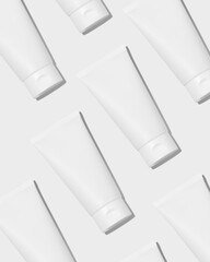 Wall Mural - Empty white plastic tubes for cosmetics. Mockup. Packaging for cream, gel, serum. Cosmetic pattern