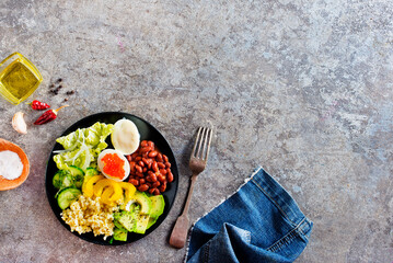 Canvas Print - Buddha bowl, balanced food, vegetarian menu. Eggs, avocado, salad lettuce, bulgur, spice